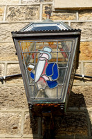 Ornate lamp over door to Pub